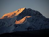09 Shishapangma East And North Faces And Yebokangal Ri At Sunrise From Shishapangma North Base Camp Shishapangma East Face shines at sunrise from Shishapangma North Base Camp (5029m). The peak with the sun�s rays just below the Shishapangma North Face is Yebokangal Ri (7365m, Jebo Kangri), which was first climbed by Jerzy Kukuczka and Artur Hajzer on August 29, 1987.